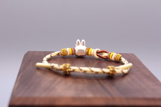 Artisan Woven Bracelet with Silver Sculpted Head Charm