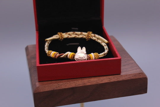 Artisan Woven Bracelet with Silver Sculpted Head Charm