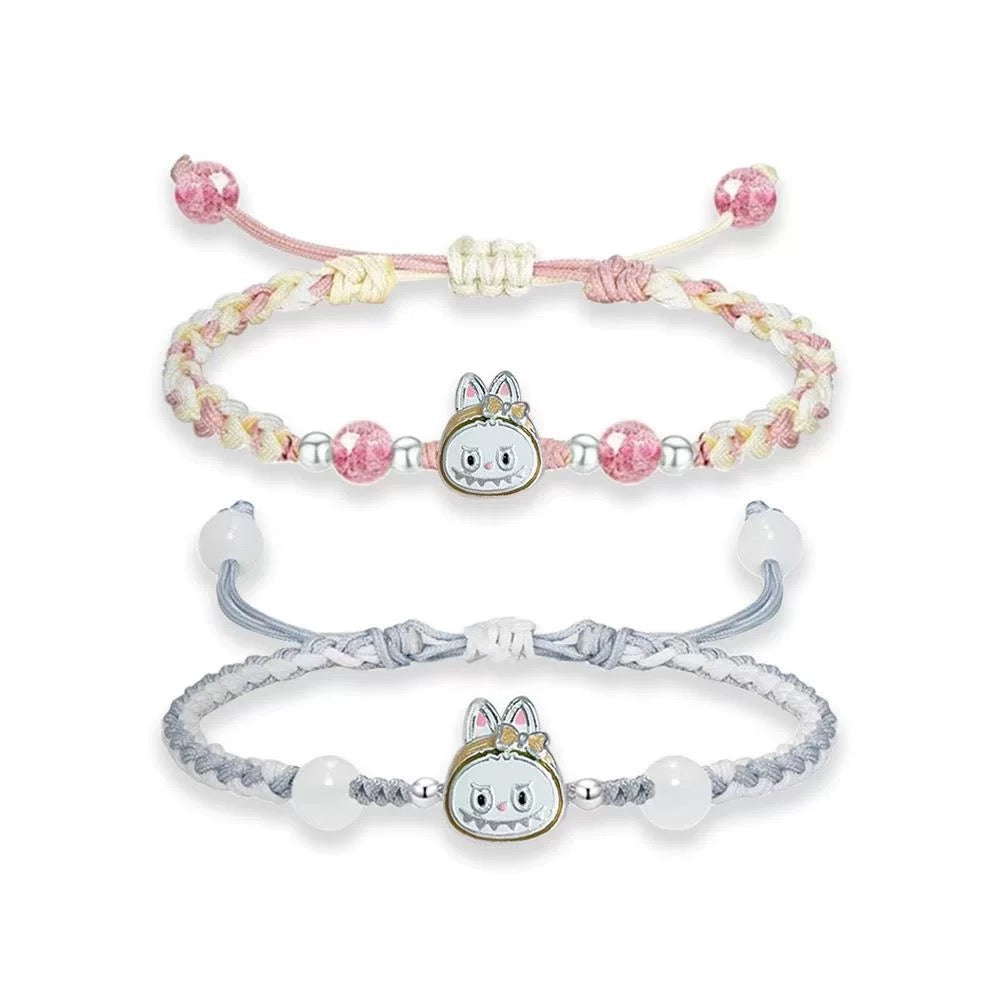 Artisan Woven Bracelet with Silver Sculpted Head Charm