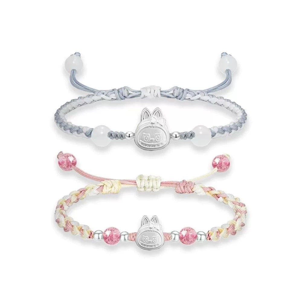 Artisan Woven Bracelet with Silver Sculpted Head Charm